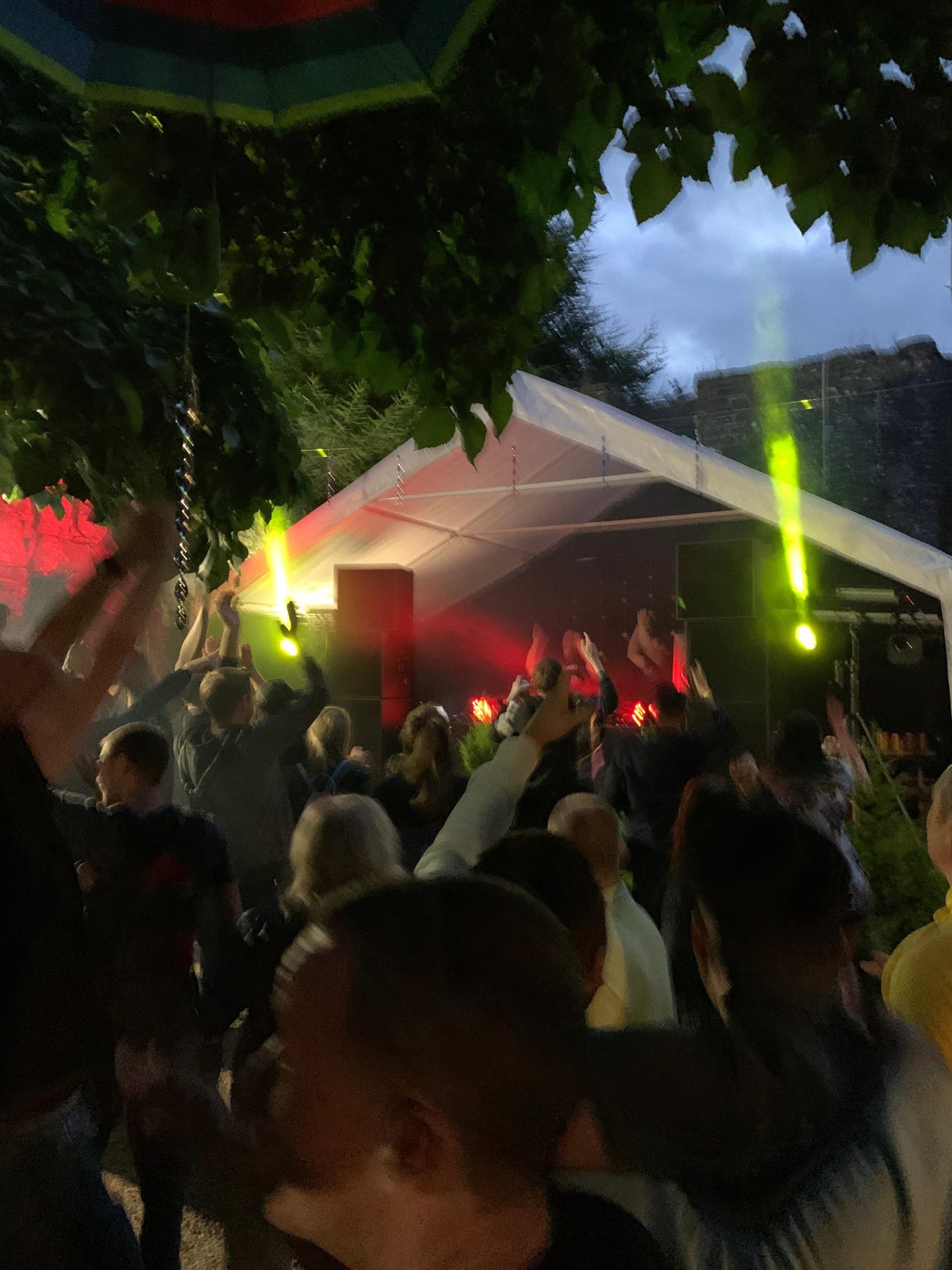 Night falls on the marquee dance floor at Mains Castle
