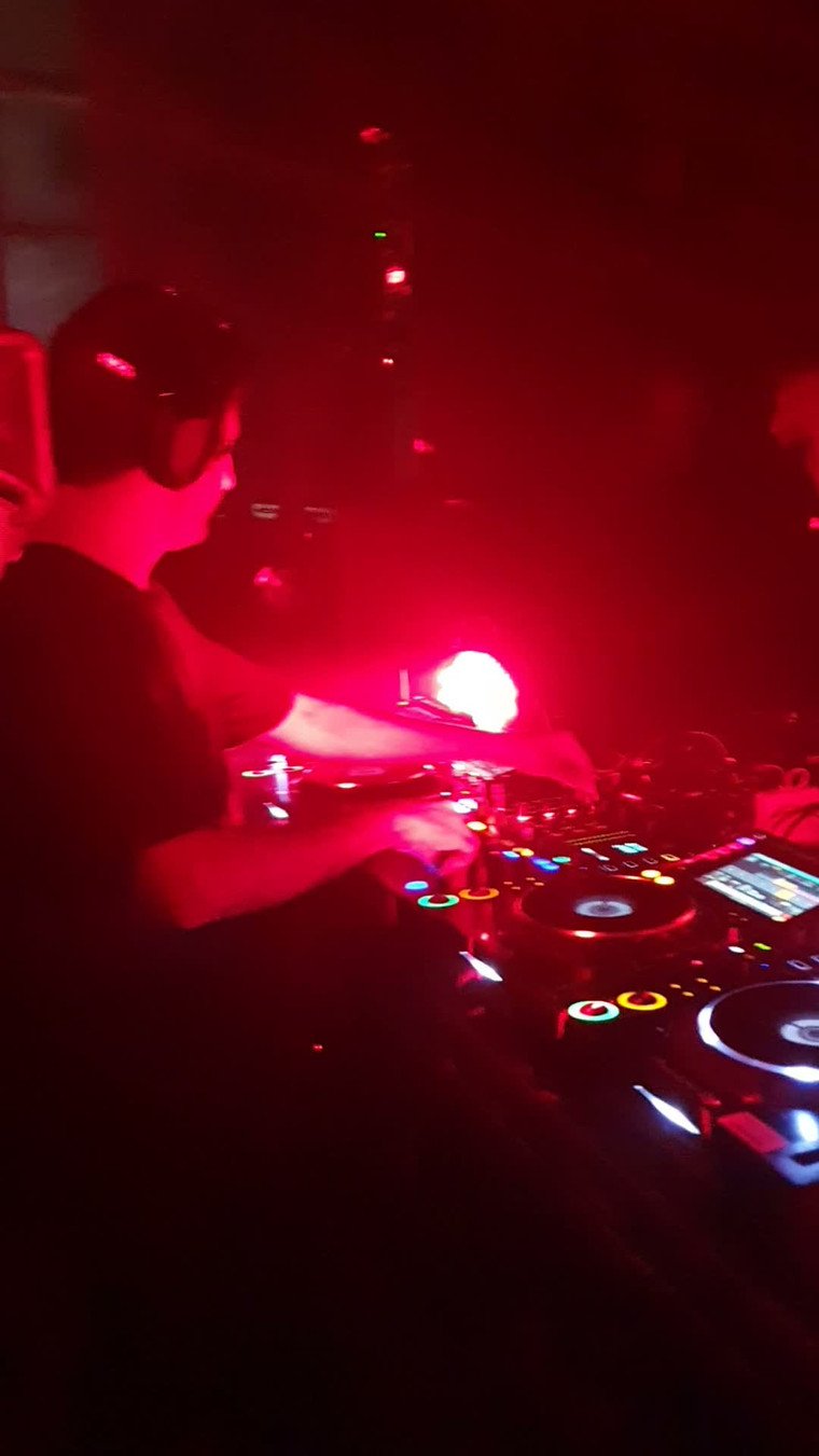Close up of the CDJs and mixer mid set