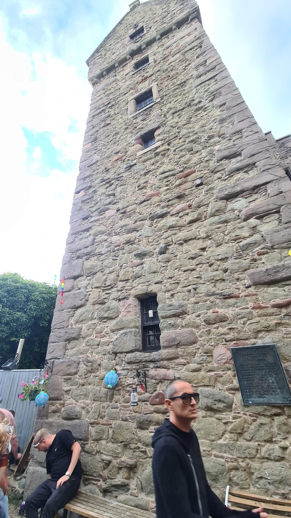 Mains Castle tower rising above the courtyard