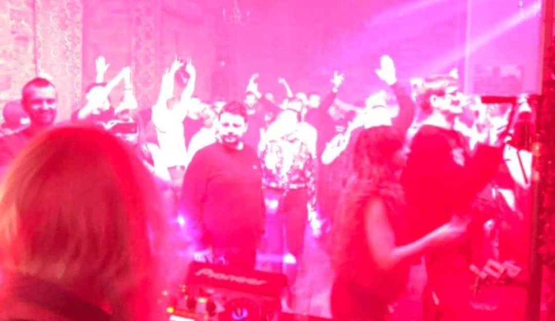 Dance floor bathed in red at Mains Castle